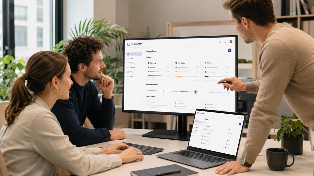 Team riunito davanti a un monitor con panoramica di progetti, stato di avanzamento e attività da completare